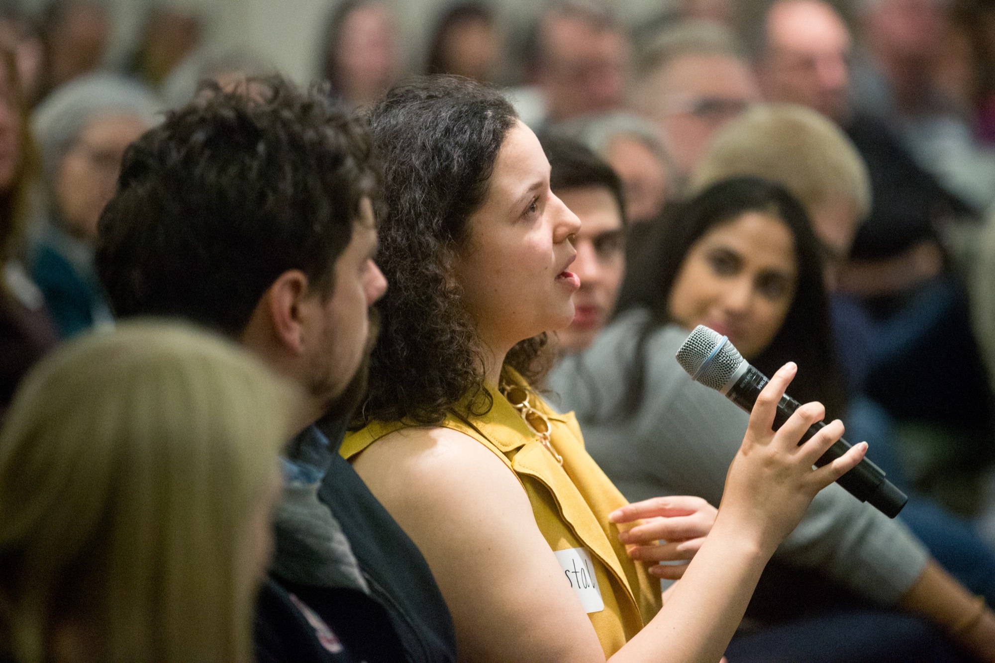 people talking at event